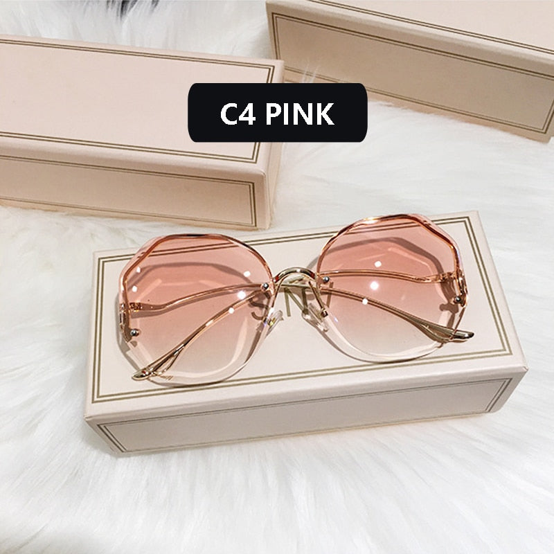 Ladies Frameless Curved Rim Sunglasses - various colours