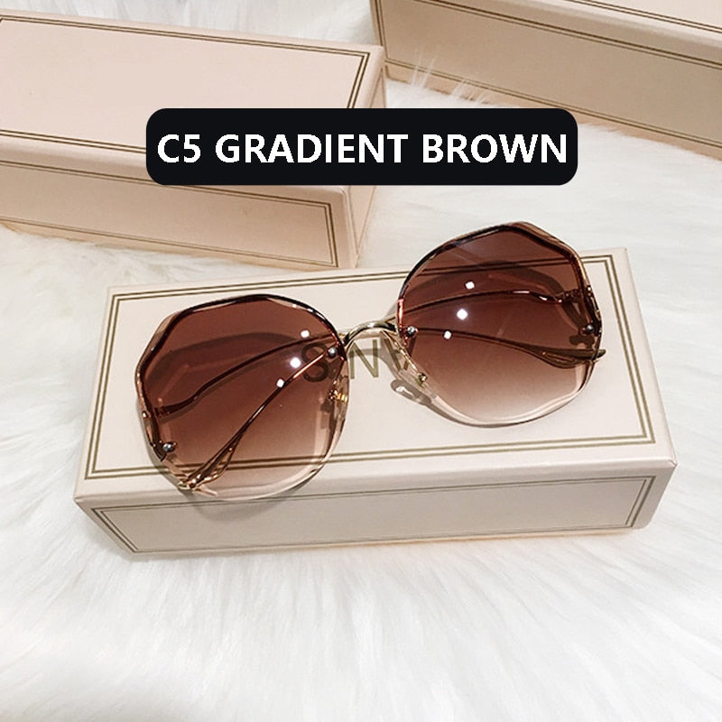 Ladies Frameless Curved Rim Sunglasses - various colours