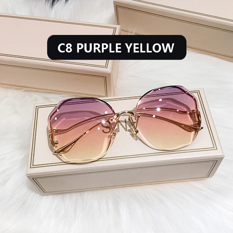 Ladies Frameless Curved Rim Sunglasses - various colours