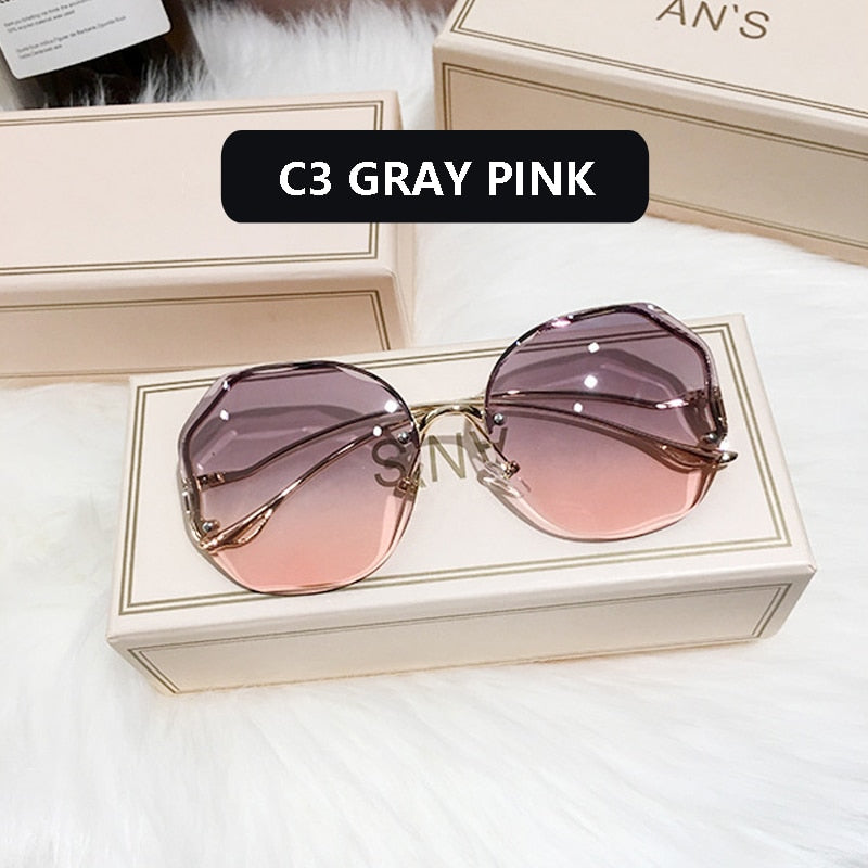 Ladies Frameless Curved Rim Sunglasses - various colours