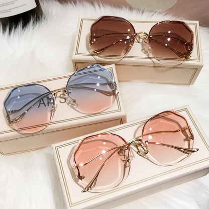 Ladies Frameless Curved Rim Sunglasses - various colours