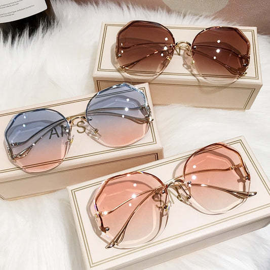 Ladies Frameless Curved Rim Sunglasses - various colours