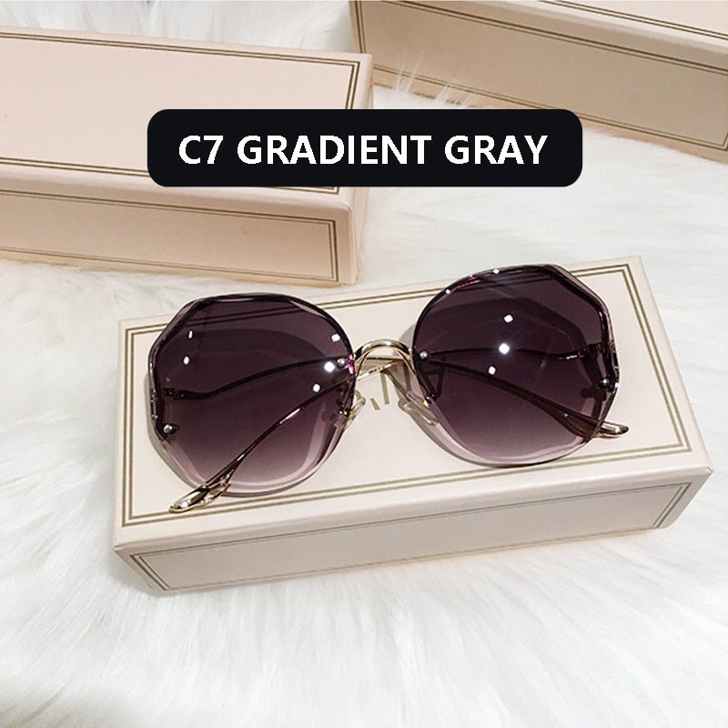 Ladies Frameless Curved Rim Sunglasses - various colours