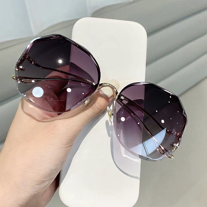 Ladies Frameless Curved Rim Sunglasses - various colours