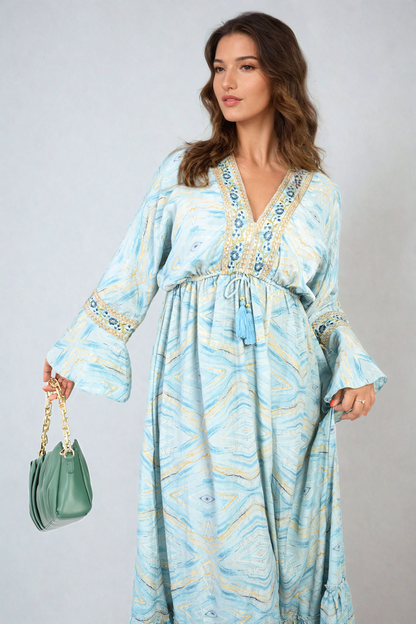 Printed Long V-Neck Ruffled Hem Maxi Dress with Front Tassel Detail